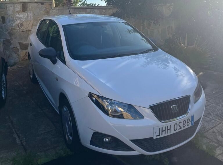 White Seat Ibiza parked outdoors – compact car rental in Alicante