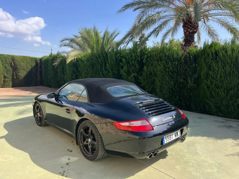 Porsche 911 Carrera S cabrio parked in Alicante, side rear view